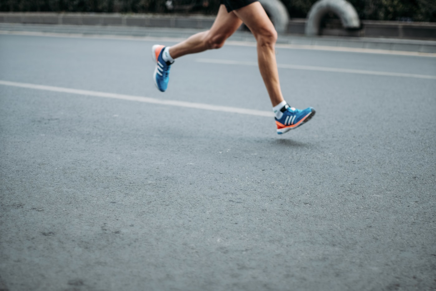 Runner on a road